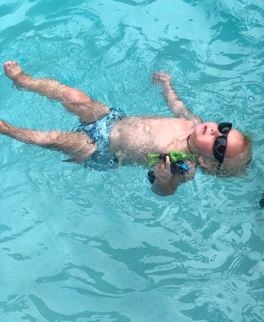 Baby Floating in Pool